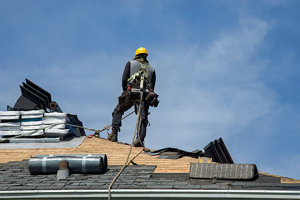Professional Roofing technician working in Montgomery Creek, CA